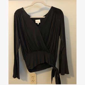Anthropologie long sleeve black tie top